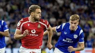 Hình ảnh cho bài Colwill lập siêu phẩm phút 98 giữ lại 1 điểm cho Cardiff trước Wrexham